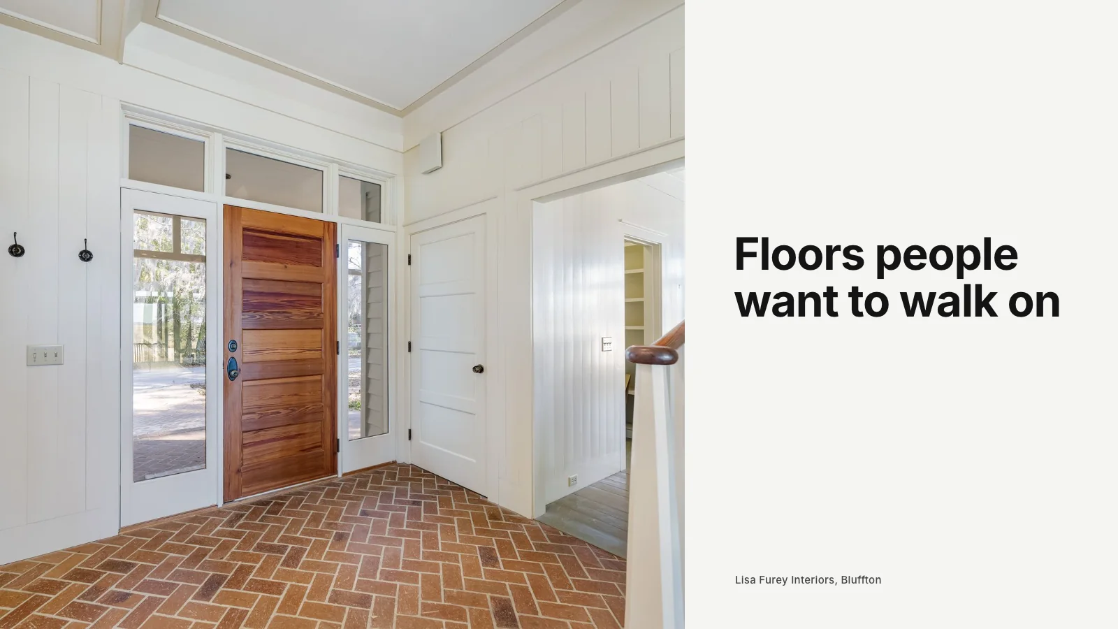 Flooring showroom with large wood and tile samples and room scene displays