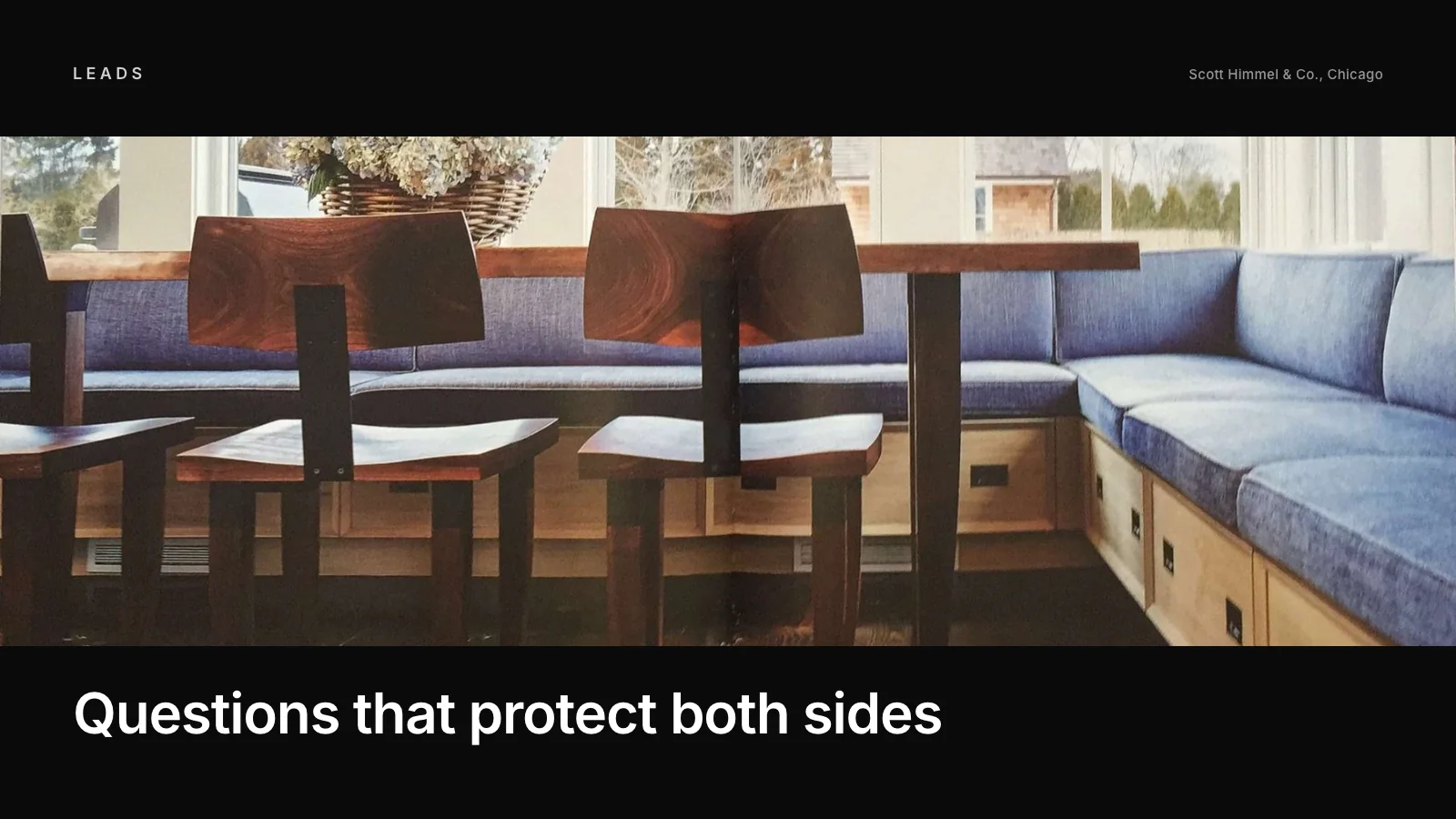 Architect taking notes during a first meeting with homeowners at their dining table